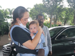 Hazel Keech snapped at the airport with her cute baby boy