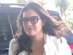 Kajol greets paps outside the airport
