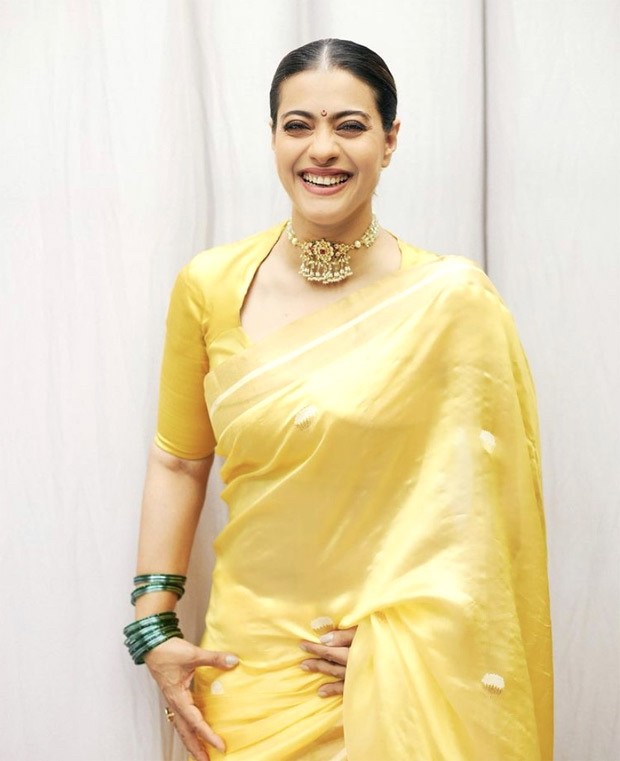 Kajol looks vivacious in Raw Mango’s yellow saree as she drops pictures from Ganesh Chaturthi celebrations