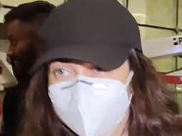 Karisma Kapoor keeps her mask on at the airport