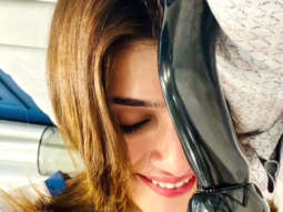Kriti Sanon glows with happiness with the Filmare award by her side