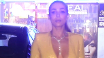 Malaika Arora poses for paps in a yellow glittery outfit
