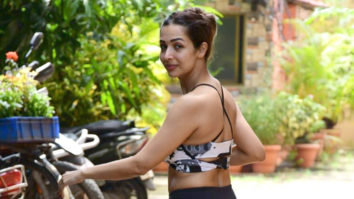 Malaika Arora waves at paps as she gets snapped outside the gym