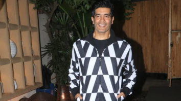 Manish Malhotra poses for paps along with Sophie Choudry