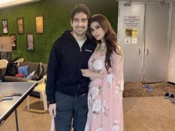 Mouni Roy looks resplendent in a floral lehenga as she poses with Brahmastra director Ayan Mukherji
