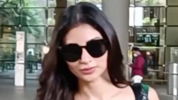 Mouni Roy poses for paps at the airport in green crop top
