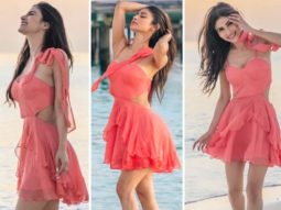 Mouni Roy ‘dances with the waves’ in a bright pink dress in new photos from Maldives vacation