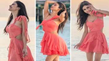Mouni Roy ‘dances with the waves’ in a bright pink dress in new photos from Maldives vacation