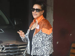 Neha Dhupia clicked in a funky orange jacket