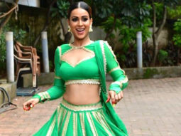 Nia Sharma poses for paps in bright green lehenga
