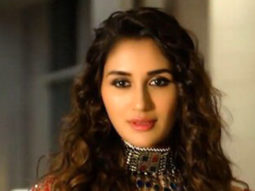 Nikita Dutta looks beautiful in a red bridal lehenga