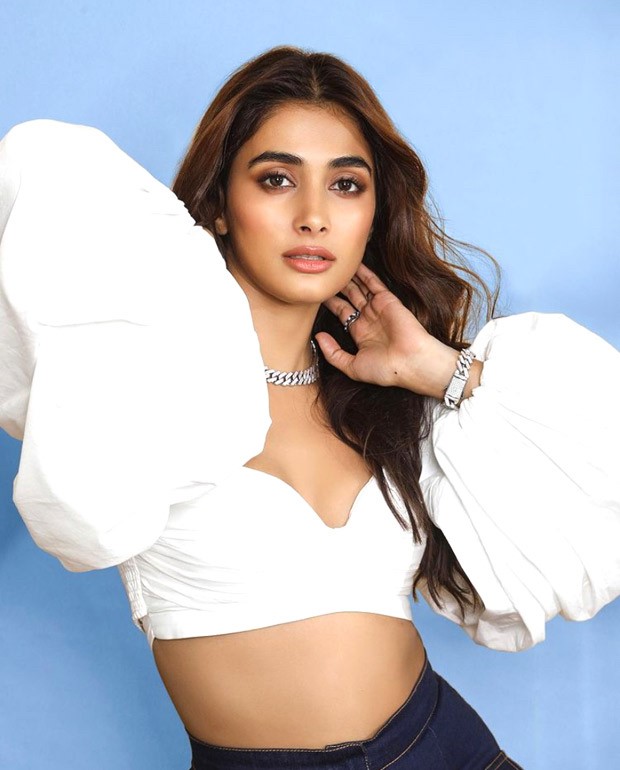 Pooja Hegde gives a trendy spin to street fashion in chic white crop top and flared pants