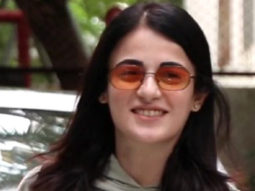 Radhika Madan poses for paps in an oversized hoodie