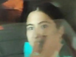 Sara Ali Khan waves at paps as she leaves in a car