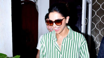 Deepika Padukone smiles for paps in a green striped oversized shirt