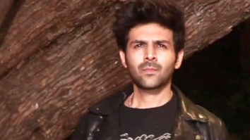 Handsome hunk Kartik Aaryan arrives in a leather jacket