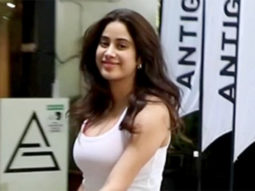 Janhvi Kapoor smiles for paps in orange gym shorts