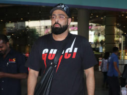 Badshah greets paps at the airport sporting a black outfit