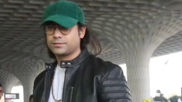 Jubin Nautiyal looks dapper in a leather jacket and green cap as he poses for paps