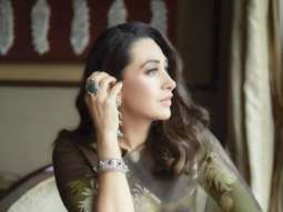 Karisma Kapoor’s floral olive-green saree worth Rs. 19K can serve as your wedding guest wardrobe inspiration