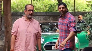 Kartik Aaryan poses for paps with Anand L Rai