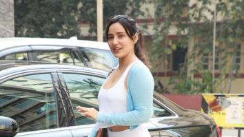 Neha Sharma flashes her cute smile in white gym outfit