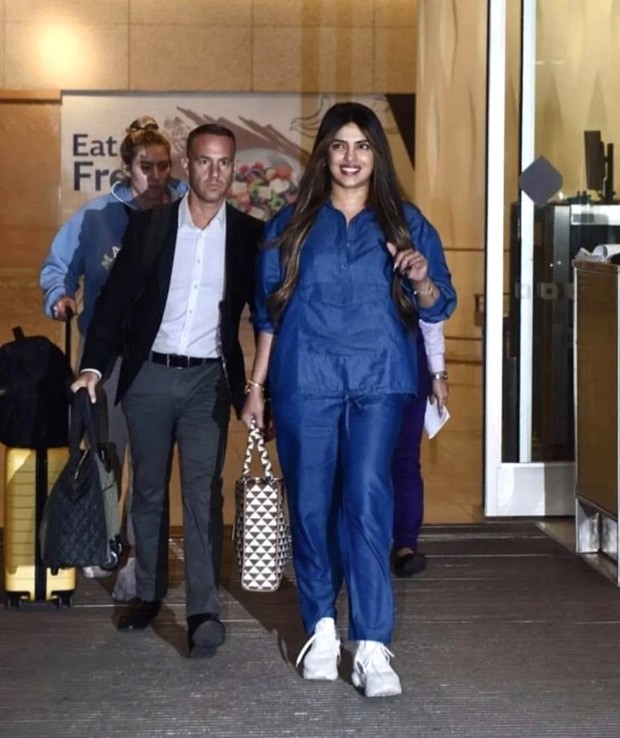 Priyanka Chopra sports denim on denim comfy look as she gets mobbed at Mumbai airport; binges on Koffee with Karan to beat jet lag
