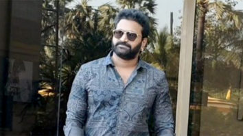 Rishab Shetty poses for paps in traditional mundu