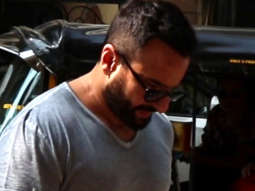 Saif Ali Khan gets clicked with Taimur outside their house