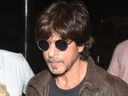 Shah Rukh Khan gets papped at the airport sporting a super cool jacket & glasses