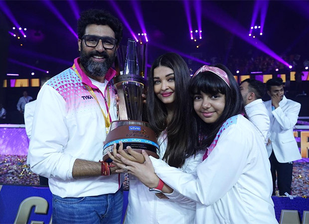 Abhishek Bachchan pulls Aishwarya Rai Bachchan into a tight hug after he bags the trophy for Pro Kabaddi League