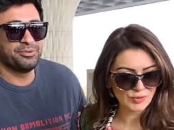 Hansika Motwani poses for paps with her family at the airport