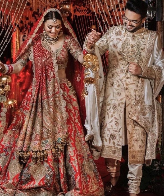 Hansika Motwani shares first pics from wedding with Sohael Khaturiya; stuns in red and golden lehenga