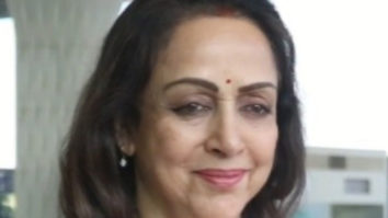 Hema Malini greets paps at the airport