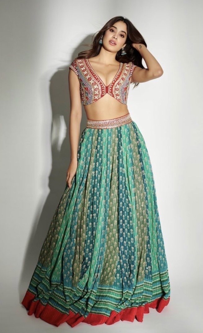 Janhvi Kapoor draws our attention to colour in a green and blue lehenga by Anita Dongre worth Rs. 1.40 lakh