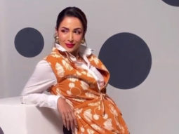 Malaika Arora efficiently pulls off a bold red lip