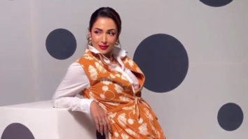 Malaika Arora efficiently pulls off a bold red lip