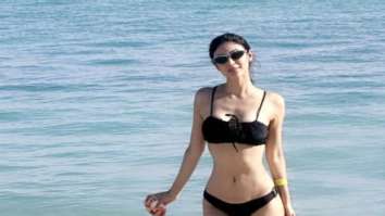 Mouni Roy sports a chic black bikini on a sunny day at beach as she is set to ring in 2023 in Dubai