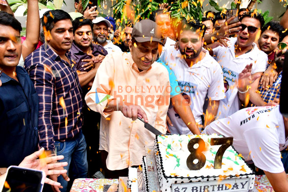 photos dharmendra celebrates his birthday by cutting cake with fans and media 1