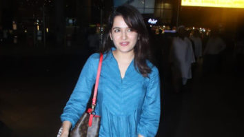 Shirley Setia smiles for paps at the airport