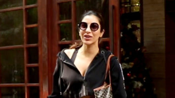 Sophie Choudry plays with a cute doggo as she poses with paps