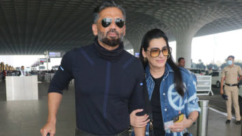 Suniel Shetty poses for paps with wife Mana Shetty at the airport