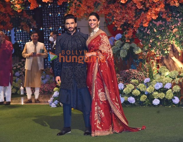 Deepika Padukone in bright red saree and Ranveer Singh in black bandgala at Anant Ambani & Radhika Merchant’s engagement party is a lesson in couple dressing for weddings