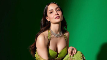 Elli AvrRam hypnotizes us with her beauty in a green traditional outfit