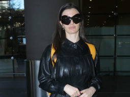 Giorgia Andriani slays her airport look with an all black outfit as she poses for the shutterbugs holding her puppy