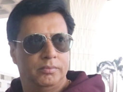 Madhur Bhandarkar greets paps a happy new year as he gets clicked at the airport