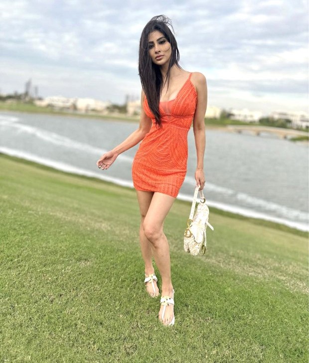 Mouni Roy welcomes in the New Year in Dubai with her husband Suraj dressed in an orange minidress