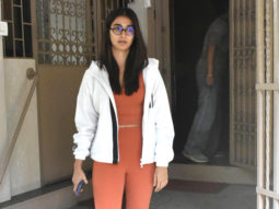 Pooja Hegde gets clicked post gym session in orange outfit