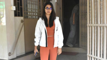 Pooja Hegde gets clicked post gym session in orange outfit