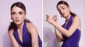Kriti Sanon's pink overcoat and bright pink pantsuit is one of the